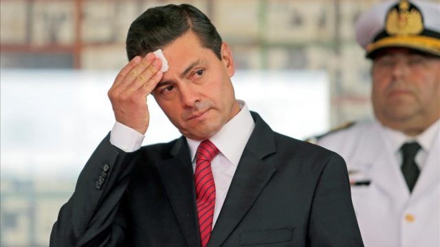 Mexico s President Enrique Pena Nieto gestures during an event in Asuncion