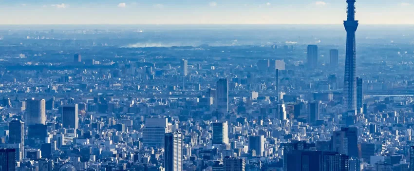 A Economia Japonesa encolhe pela 1ª vez em 6 trimestres. Descubra o impacto das tarifas dos EUA no PIB, exportações e consumo. Um guia essencial para expatriados.